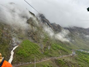 A breathtaking Himalayan trail winding through mist-covered mountains, capturing the essence of spiritual journeys and adventure trekking