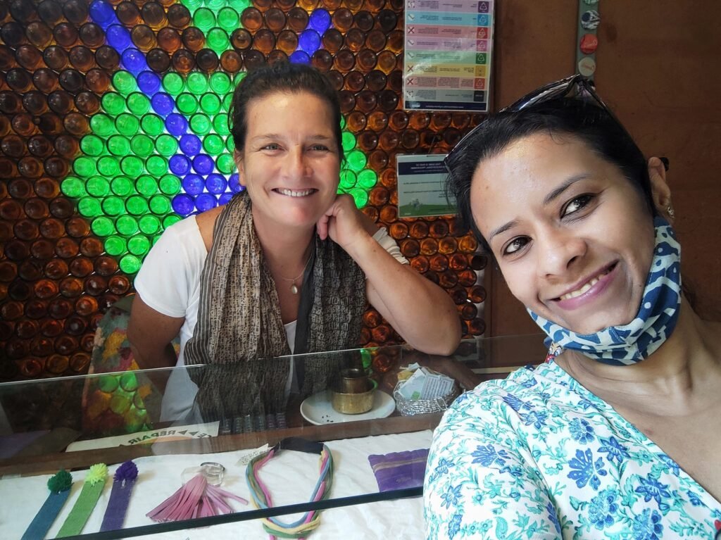 A warm interaction at an eco store in Auroville—moments like these made the experience deeply human and unforgettable.